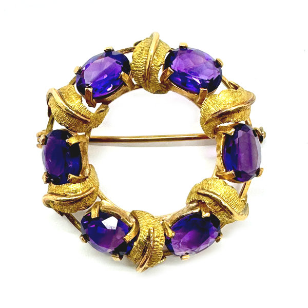 Hübsche Brosche mit Amethysten